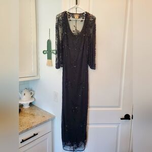 Formal beaded black 2-piece maxi gown. Size 16, fits an XL. Detailed sequin